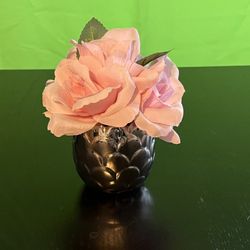 Pink flowers in Silver vase
