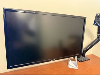 Two Samsung 28inch monitors with a dual screen holder. 4K 60hz.