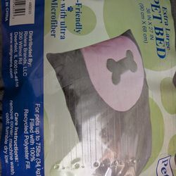 NEVER USED.  Large dog bed for up to 75lbs