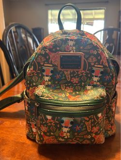 Disney parks 2022 lounge fly enchanted tiki room mini backpack