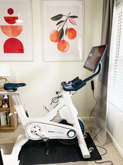 MYX FITNESS STATONARY  BIKE..TOTAL FITNESS SYSTEM WITH SWIVEL TOUCHSCREEN TABLET 22 INCHES...