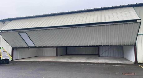 Large Commercial Bifold Hangar Door storage unit