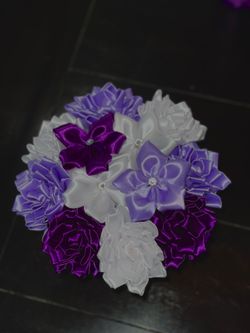 Pot and ribbon roses $55