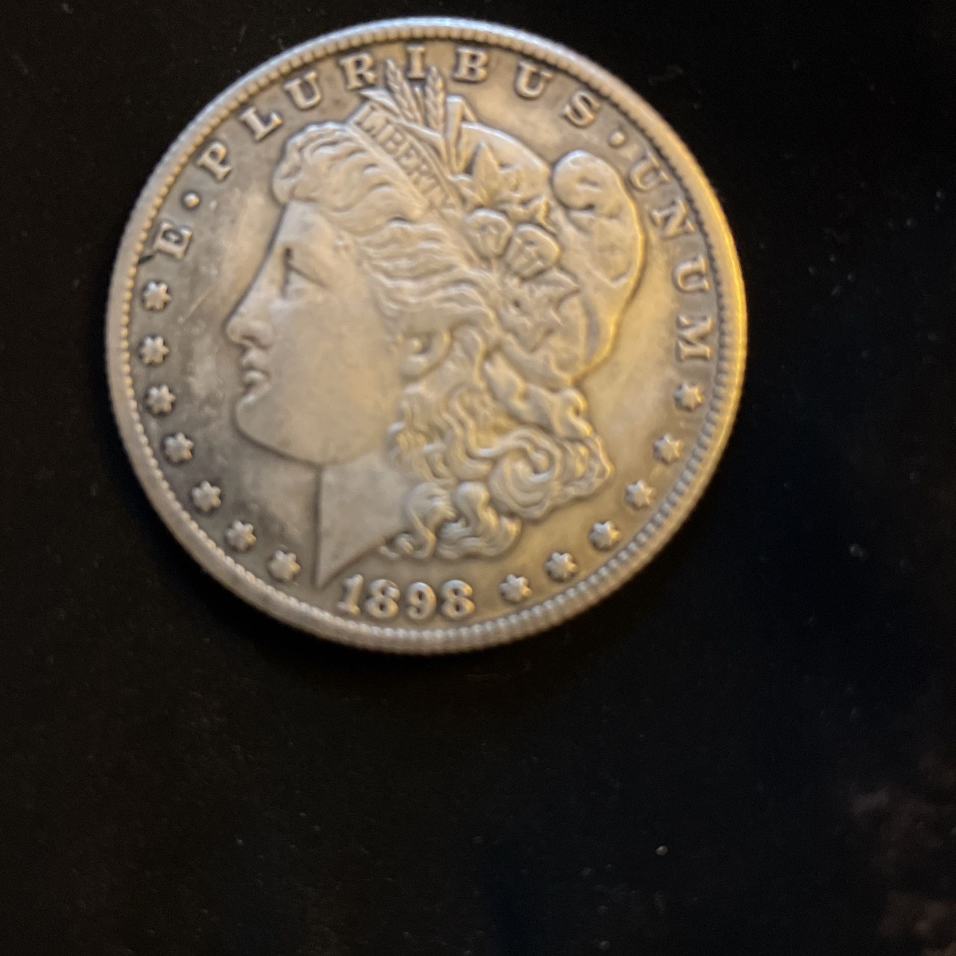 1898 Morgan Silver Dollar.