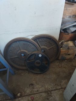 Weight lifting plates, bars, dumb bells.