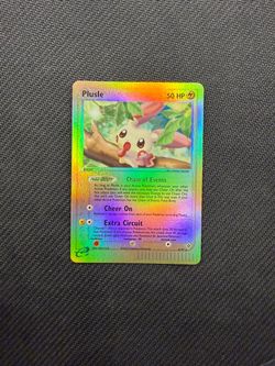 Plusle reverse holo e reader NM. Done by the goat artist “Nishida”