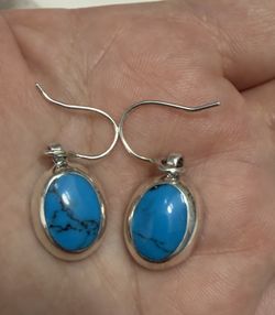 Turquoise earrings with sterling silver hooks $50