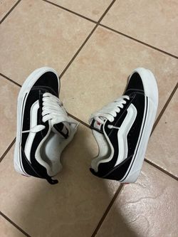Black and white Knu School vans
