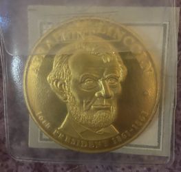Abraham Lincoln Presidential Dollar Trials Inlay W/ 24KT Gold Proof Coin