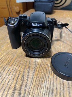 Nikon Coolpix P80 10.1MP Digital Camera BundleW/ Charger/ 2 Batteries/ SD Card