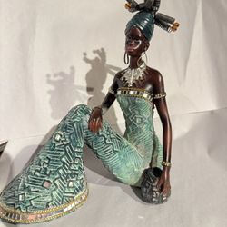Vintage African American 9” H Resin Princess figurine sitting holding a basket  
