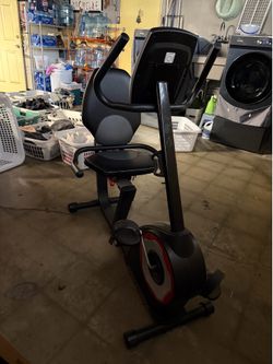 Stationary exercise bicycle