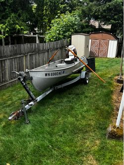 12 ft aluminum boat & trailer. $1000 OBO