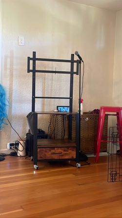 TV stand on wheels with storage drawer