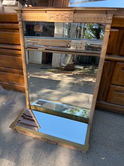Vintage wall mirror with mirrored bottom display shelf