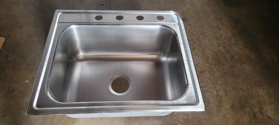 25"L X 22"W x g"D dol mount. single bow kitchen sink 20-gauge stainless steel Four faucet holes ELKAY