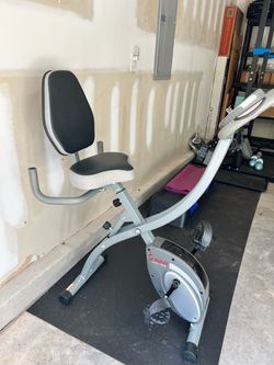 Sunny Health & Fitness Foldable Exercise Bike – Padded Seat with Backrest, Magnetic Resistance