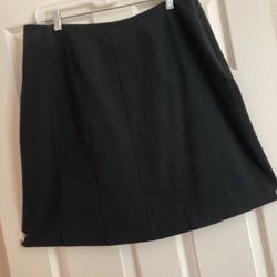 Black skirt with flat detailing & smooth side zipper - size 12