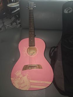 First Act "Rock Queen" guitar and case, pink and marked to learn (MG5401)