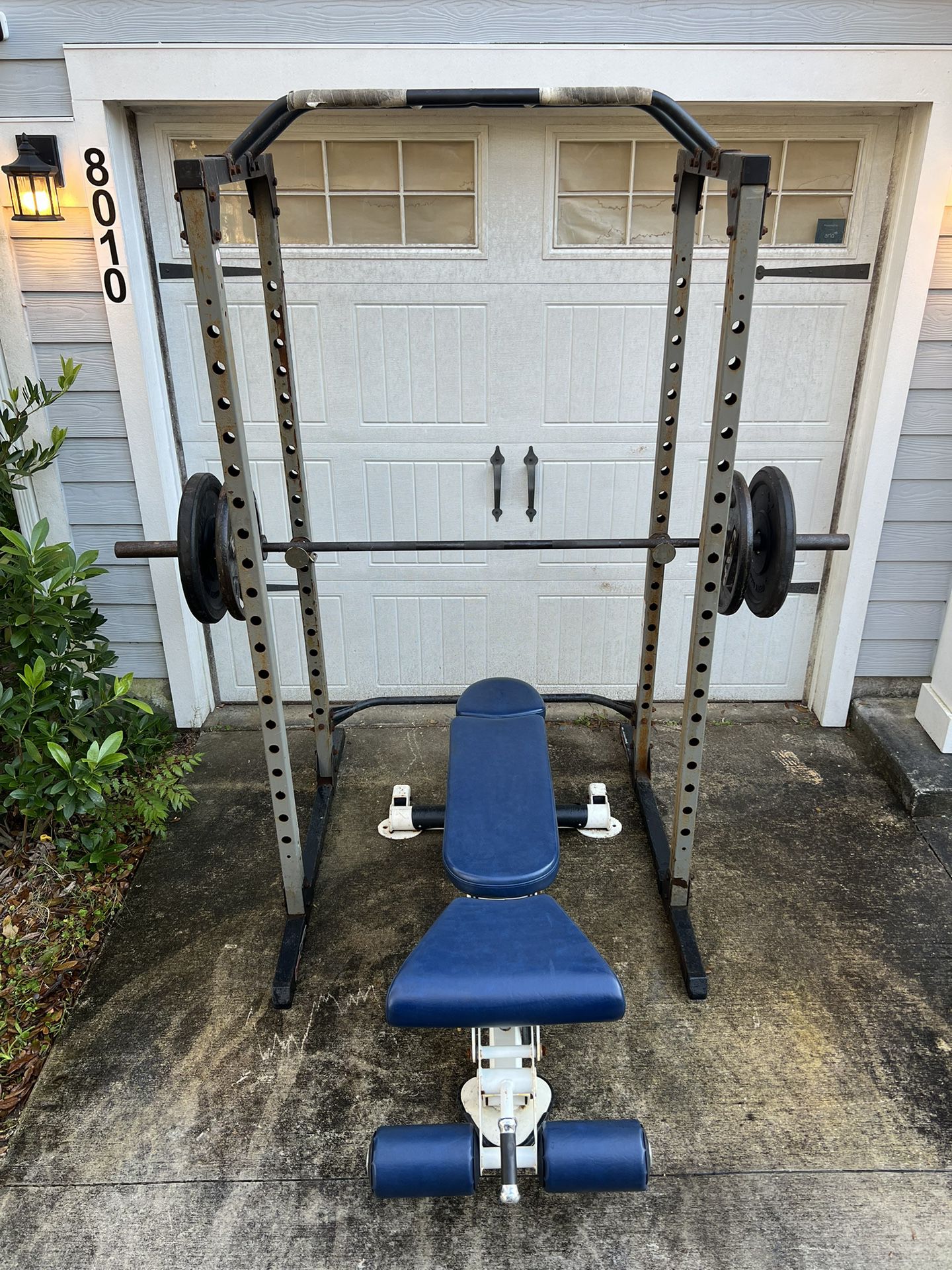 Squat Rack, Weight Bench, Plates, And Bar
