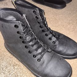 Dr. Martens boots with bouncing soles.