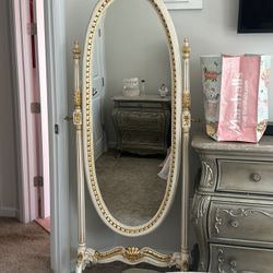 Antique oval body length mirror