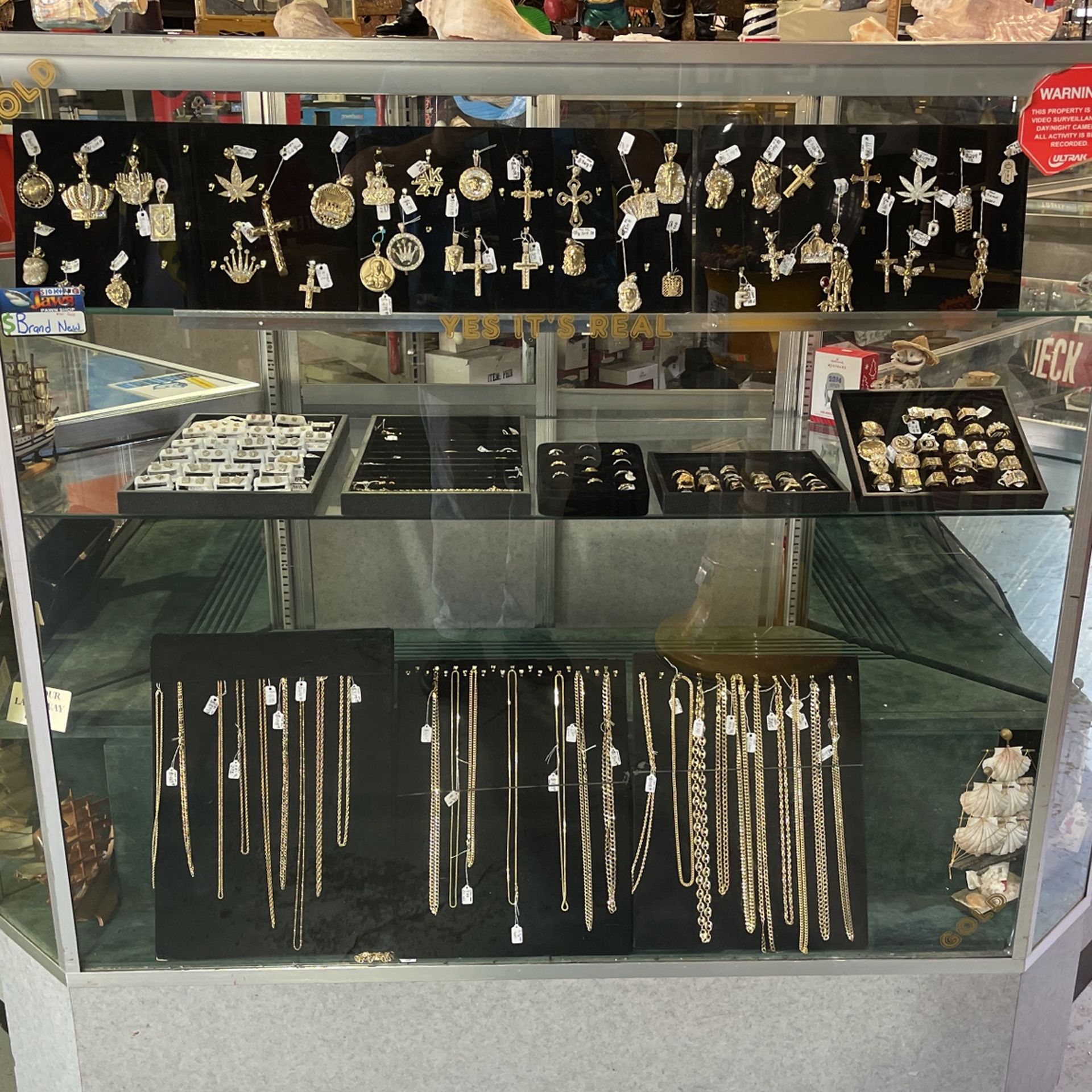 Large Selection of men’s 10 and 14 karat gold chains bracelets rings pendants earrings