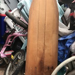 An Old fashioned Iron Board, Made Of Wood , The Legs Are In Metals , Very Strong