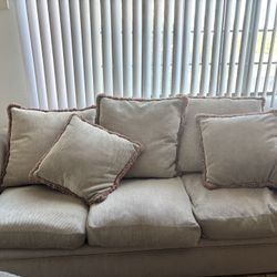 Beige Feather Couch And Love Seat