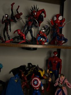 Action figures (Spiderman, Flash, Batman, Wolverine)