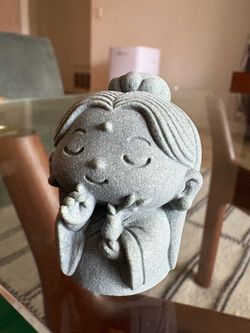 Chibi deity figurine