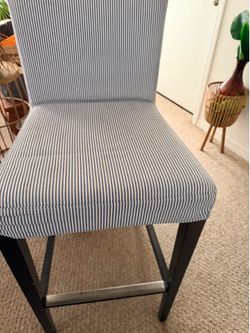 2 Tall barstool chairs.