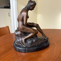 Brass Sculpture On Marble 