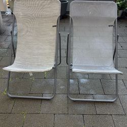 Lafuma Patio Lounge Chairs (Kitchen kaboodle, 2022) One Is Light Grey and the other Medium Grey and Ivory 