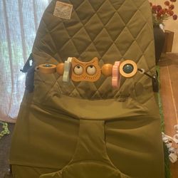 Baby bouncer with toy