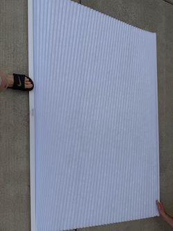 White, light filtering window shade