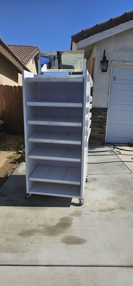 USED AS A HAT RACK MOVABLE SHELVES