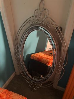 Glass foyer table with detached mirror