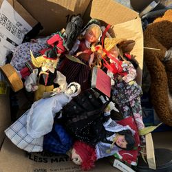 Tiny different dolls, one dollar off