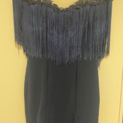 Evening dress, available in Large and medium sizes.