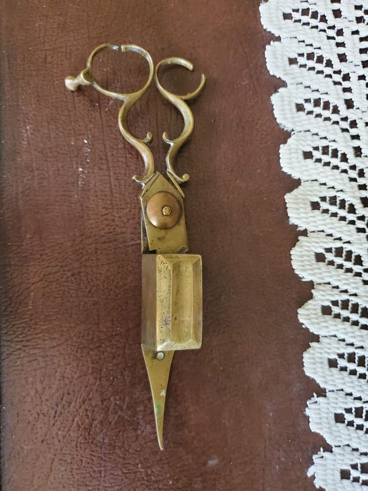 Vintage brass candle snuffer