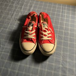 Classic red Converse All Star sneakers in good condition. Size 8