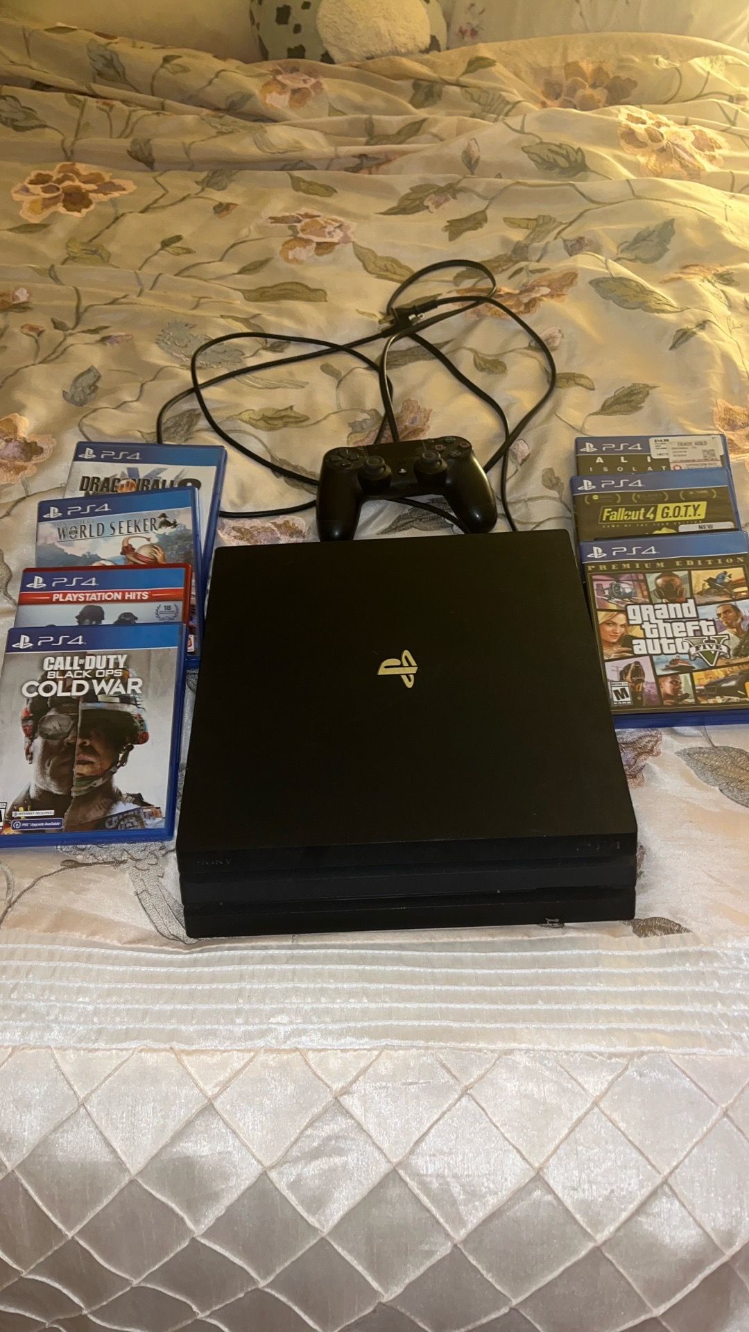 PS4 PRO BUNDLE- Like new w/ Controller, Cables and 7 Games