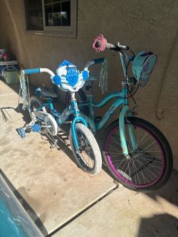 2 girls bikes and electric car