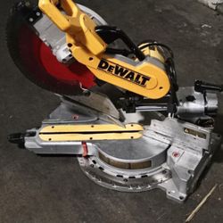DeWalt 12" inch double Bevel sliding miter saw this machine has been serviced new bearings brush new gear belt runs very smoothly like new 
