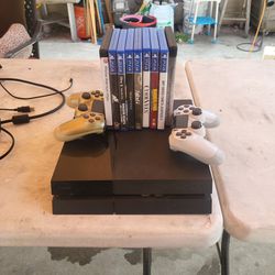PS4 (2 Controllers And A Few Games)