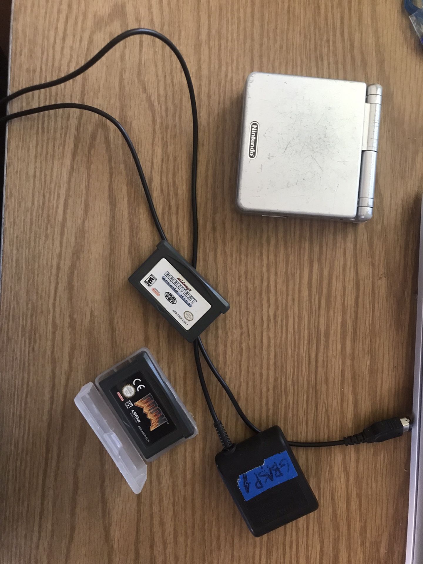 Game Boy SP w/charger, Doom, Midways Greatest Arcade Hits