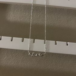 Tiffany & Co “peace” necklace 