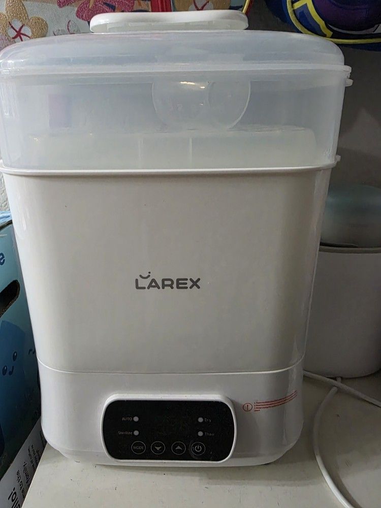 Baby Bottle Sterilizer And Dryer.