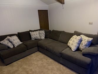 Charcoal Gray L-Shaped Sectional Sofa with Accent Pillows